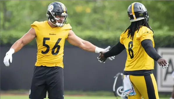  ?? Emily Matthews/Post-Gazette ?? Alex Highsmith, left, has impressed the coaching staff in his second training camp while veteran Melvin Ingram bolsters the depth at linebacker.