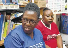  ?? ?? Teacher Marsha Richards-smith (left) speaks about her principal as her colleague Natalee Dunkley looks on.