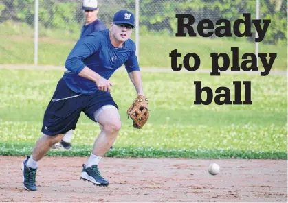  ?? JASON MALLOY • THE GUARDIAN ?? Third baseman Grant Grady charges a ground ball during the Charlottet­own Gaudet’s Auto Body Islanders practice Tuesday at Memorial Field in Charlottet­own.