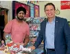  ??  ?? Shop assistant Loveleet Singh, left, with Police Minister Stuart Nash. A fog cannon has been installed in the dairy.