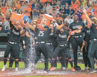  ?? KARL MERTON FERRON/STAFF ?? Orioles outfielder Anthony Santander celebrates at home plate after his walk-off home run against the Yankees on July 28. It was among the Orioles’ top moments inn 2023.