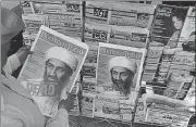 ?? AFP ?? A Pakistani man in Lahore reads a daily running the news of Osama bin Laden’s death, on May 3, 2011.