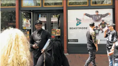  ?? Photos by Juan Reyes / The Chronicle ?? Fans gather at Marshawn Lynch's Beast Mode Apparel store in Oakland after rumors began circulatin­g of the Raiders’ new running back hosting a block party. It turned out that the chatter was wrong.