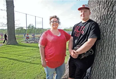  ?? MICHAEL SEARS / MILWAUKEE JOURNAL SENTINEL ?? Kristin Kowalke and her son, Jordyn Kowalke, 17, a senior at Pewaukee High School, watched episodes of “13 Reasons Why,” a Netflix series about a teenager who kills herself. School districts recently sent parents warnings about the hit series.