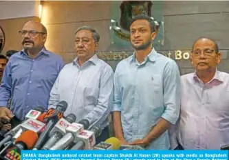  ??  ?? DHAKA: Bangladesh national cricket team captain Shakib Al Hasan (2R) speaks with media as Bangladesh Cricket Board (BCB) president Nazmul Hassan Papon (2L) stands next to him at the Sher-e-Bangla National Stadium in Dhaka yesterday. — AFP