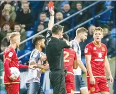  ??  ?? OFF YOU GO: MK Dons’ George Williams is sent off