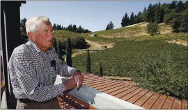  ?? DAN COYRO — STAFF ARCHIVES ?? In this 2012 photo, David Bruce looks out over the vineyard acreage he bought and planted in 1961 at his namesake Santa Cruz Mountains winery.