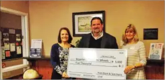  ?? REBECCA BLANCHARD — DIGITAL FIRST MEDIA ?? Local realtor Brent Harris (center) presented a $5,000 check to Meals on Wheels Case Manager Diane Joyce and Boyertown Multi-Service Executive Director Karen Youse. The donation will benefit the Meals on Wheels program.