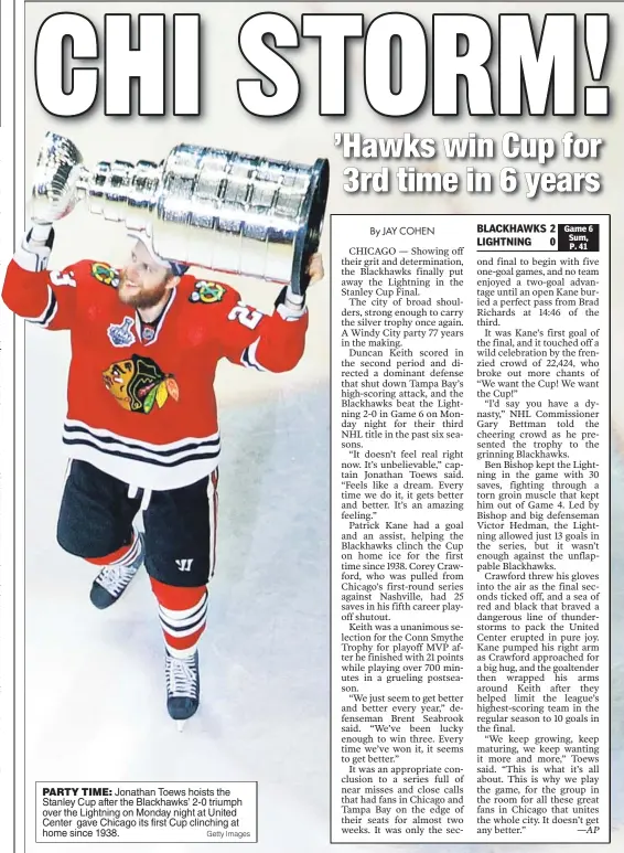  ?? Getty Images ?? PARTY TIME: Jonathan Toews hoists the Stanley Cup after the Blackhawks’ 2- 0 triumph over the Lightning on Monday night at United Center gave Chicago its first Cup clinching at home since 1938.