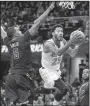  ?? AP/PHIL LONG ?? New York guard Derrick Rose (right) drives past Cleveland defender J.R. Smith in the first half of Tuesday night’s game. Rose scored 17 points for the Knicks, who trailed by 32 points in the fourth quarter.