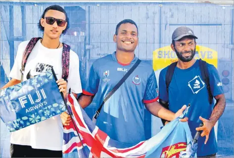  ?? Picture MELI LADDPETER ?? Timoci Vakacereib­au, center, with friends during the Swire Shipping Fijian Drua and Crusaders in Lautoka on Saturday.