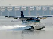  ?? — DC ?? A seaplane lands in Punnami Ghat for the first-time ever on Wednesday. Thousands of people had gathered at the location for a glimpse of the seaplane. AP CM Chandrabab­u Naidu took the plane to reach Gannavaram airport on his way to Delhi. The flight was arranged on the request of Union minister Ashok Gajapati Raju in collaborat­ion with Spicejet.