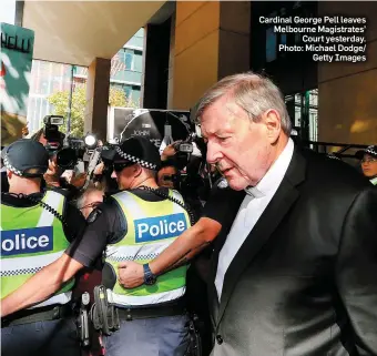  ??  ?? Cardinal George Pell leaves Melbourne Magistrate­s’ Court yesterday. Photo: Michael Dodge/ Getty Images