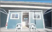  ?? LAURA A. ODA — BAY AREA NEWS GROUP ?? One of 20 Tuff Sheds converted into rooms to house two people is seen during a tour of the newest community at Northgate Avenue and 27th Street in Oakland on Monday.