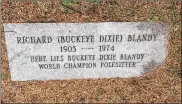  ?? TOM ARCHDEACON / STAFF ?? The gravestone of Richard “Buckeye Dixie” Blandy at Woodland Cemetery.