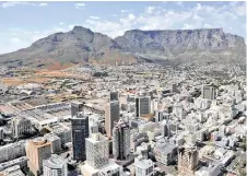  ?? MATTHEW JORDAAN/African News Agency (ANA) ?? AN AERIAL view of Cape Town’s Table Mountain and city centre. |