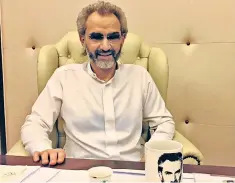  ??  ?? Prince Alwaleed bin Talal sits in the hotel suite where he was detained for three months. He has now bought a £210m stake in Deezer