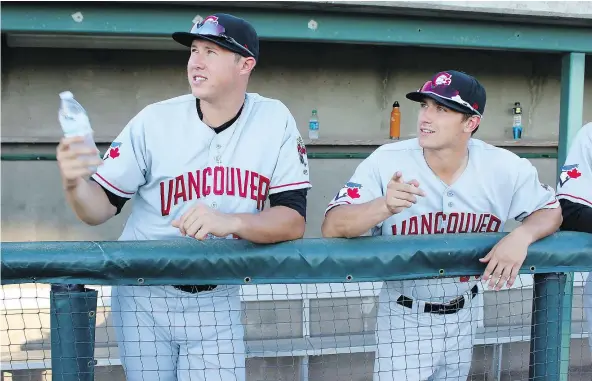  ??  ?? Vancouver Canadians pitcher Nate Pearson, left, says he loved how MLB strikeout king Nolan Ryan approached the game.