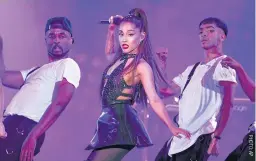  ??  ?? Ariana Grande, centre, performs at Wango Tango in Los Angeles.