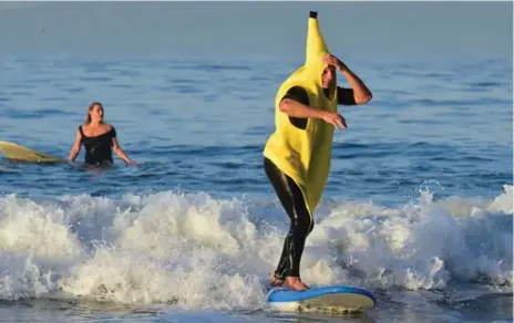  ?? FREDERIC J. BROWN/AFP/GETTY IMAGES FILE PHOTO ?? Rasta Imposta began selling the banana costume in 2001 and considers the banana “one of the company’s most important costumes.”