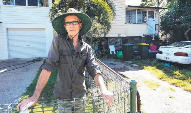  ??  ?? FED-UP NEIGHBOUR: Peter Monks-Saint-Clair is sick of living next to a home in Little St, Manunda, where he has complained about the mess.