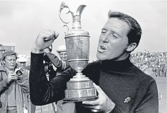  ?? Picture: PA. ?? Gary Player shows the Claret Jug trophy to the crowd at Carnoustie in 1968 in a repeat of his 1959 victory.