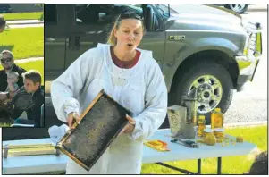  ?? Photos by Bailey Nelson ?? Beekeeper, Darla Neustel shows off her hive and honey at the VCBC Public Library.