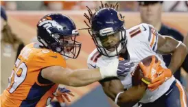  ?? DAVID ZALUBOWSKI/AP ?? Kevin White had two receptions for 15 yards and drew a pass-interferen­ce penalty that turned into a 37-yard gain Saturday against the Broncos.