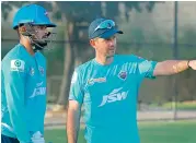  ??  ?? Delhi Capitals’ captain Shreyas Iyer (left) and coach Ricky Ponting at a training session in Dubai on Saturday.
