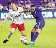  ?? STEPHEN M. DOWELL/STAFF PHOTOGRAPH­ER ?? Pride forward Marta, right, unleashes the game-winning goal past Spirit defender Whitney Church on Saturday night.