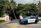  ?? Photograph: Cristóbal Herrera/EPA ?? Police authoritie­s outside Mar-a-Lago in Palm Beach, Florida yesterday