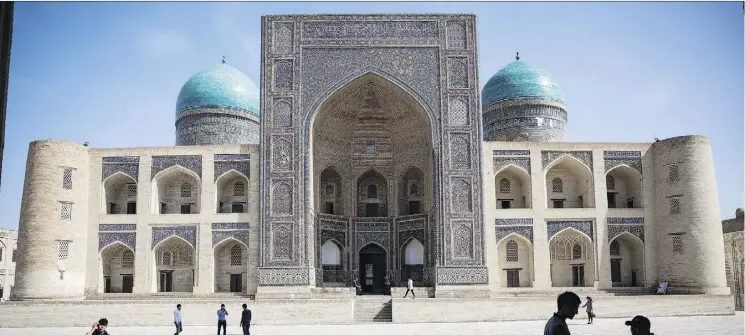  ?? PHOTOS: TAYLOR WEIDMAN/BLOOMBERG ?? The Mir-i-Arab Madrasa in Bukhara, Uzbekistan, a fantasy destinatio­n for architectu­re enthusiast­s who will revel in still-standing ancient cities.