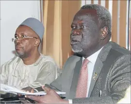  ?? Samir Bol Associated Press ?? MINISTER OF HEALTH Dr. Riek Gai Kok, right. South Sudan’s health ministry directed the vaccinatio­ns, with support from the World Health Organizati­on.