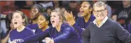  ?? Alonzo Adams/Associated Press ?? The UConn bench celebrates during the second half of a 72-63 comeback win over Oklahoma Wednesday.