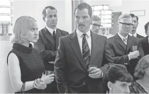  ??  ?? Rachel Brosnahan, left, and Benedict Cumberbatc­h, center, in a scene from “The Courier.”