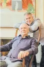  ??  ?? Playwright Terrence McNally, center, relaxes at his home in New York City with his husband, Tom Kirdahy, in 2018.