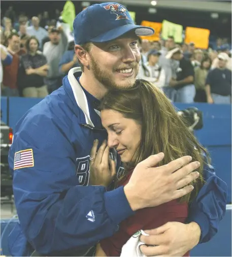  ?? FILES ?? A compelling new book delves into former Blue Jays pitcher Roy Halladay’s life, career and tragic death, with candid insight from his wife Brandy.