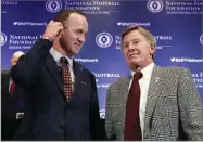  ?? AP PHOTO BY RICHARD DREW ?? Former University of Tennessee football quarterbac­k Peyton Manning, left, and former University of Florida football quarterbac­k Steve Spurrier get together Tuesday after a news conference of the National Football Foundation and College Football Hall of...