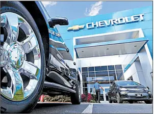  ?? AP/STEVE HELBER ?? Chevrolet SUVs sit in front of a dealership in Richmond, Va., in April. U.S. auto sales rose 6.1 percent to just over 1.5 million vehicles in September, according to Autodata Corp.