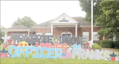  ?? LYNN KUTTER ENTERPRISE-LEADER ?? This life-size sign was placed in front of Prairie Grove City Hall for the “Welcome Home” parade for Officer Tyler Franks. He was released from a rehabilita­tion center on June 2 and returned home to continue his recovery.