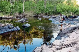  ?? — MING TEOH/The Star ?? Kakadu National Park, Northern Territory, Australia, is where you can go bush walking and trek up to waterfalls.