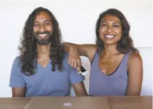  ?? Liz Hafalia / The Chronicle ?? Chief Technology Officer Parag Chordia and CEO Prerna Gupta work at their Brisbane home on their startup, Hooked.