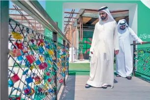  ?? Wam ?? Sheikh Mohammed tours Last Exit D89 at The Yard in Al Khawaneej, Dubai, on Thursday. The third phase of the project will include many public and entertainm­ent facilities. —