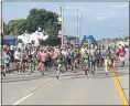  ?? TIM PHILLIS — FOR THE NEWS-HERALD ?? Runners begin the 2019 Johnnycake Jog outside the Lake County Fairground­s.