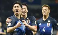  ?? JIJI PRESS/AFP ?? TRIO PILAR: Dari kiri, Shinji Kagawa, Shinji Okazaki, dan Keisuke Honda kembali diandalkan Jepang saat menghadapi UEA malam nanti.