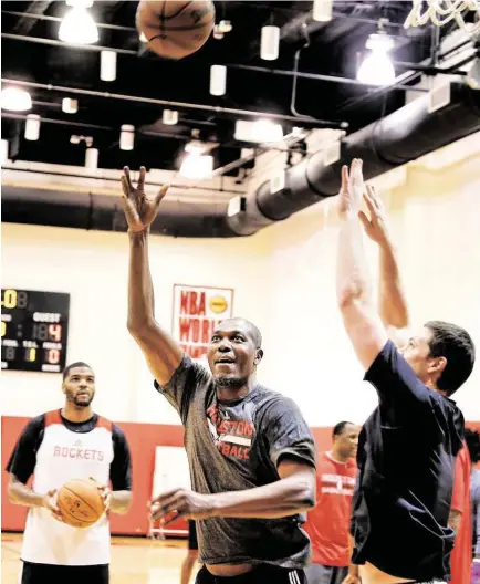  ?? James Nielsen / Houston Chronicle ?? At age 52, Hakeem Olajuwon may not be of much help in defending Blake Griffin, but the Hall of Famer was on hand to help out at the Rockets’ practice Tuesday and certainly could lend some advice on overcoming playoff deficits.