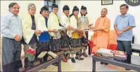 ?? HT PHOTO ?? Chief minister Yogi Adityanath with Indonesian artistes in Lucknow on Saturday.