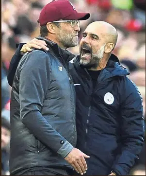  ??  ?? There’ll be goals this time: Manchester City manager Pep Guardiola (right) sharing a light moment with his Liverpool counterpar­t Juergen Klopp after the sides’ first Premier League clash at Anfield last Oct 7. That game ended 0- 0. — AP