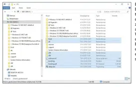  ??  ?? Door bijvoorbee­ld een hashteken vooraan de mapnaam te zetten, geef je aan van welke Windows-versie de installati­ebestanden op dat moment in de root-directory staan.