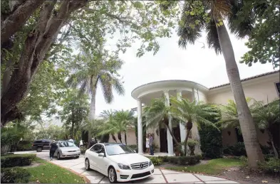  ?? Wilfredo Lee / Associated Press ?? The exterior of a home that once belonged to 1970s heartthrob David Cassidy in Fort Lauderdale, Fla. on July 22, 2015. The home has been sold for $ 2.6 million. Cassidy rose to fame as a teen idol who starred in “The Partridge Family.” He died at age 67 in 2017.